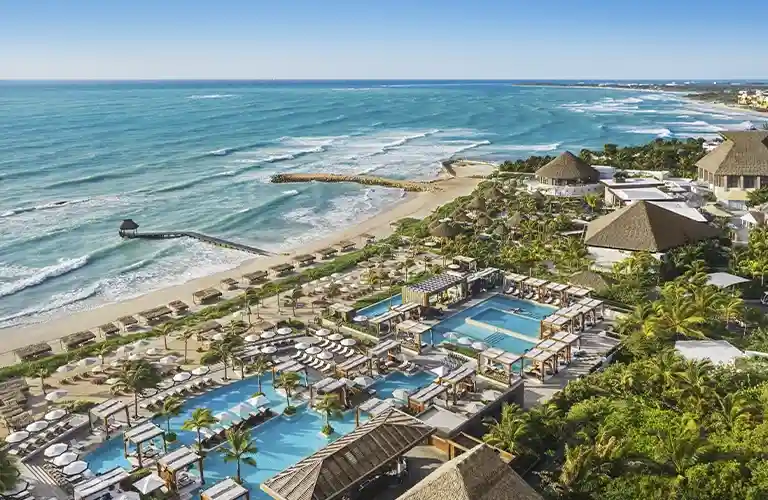 https://www.develoment.sqnescapes.com/Riviera Maya Vidanta resort showcasing lush greenery, sparkling pools, and luxurious accommodations